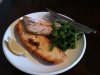 Pan fried fish with crusty white bread and broccolini